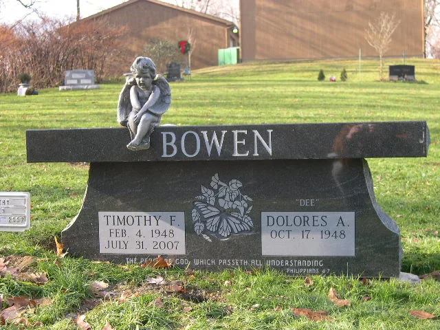 A granite memorial bench crafted by American Monument & Granite Co.