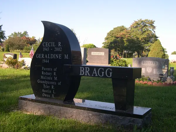 A granite memorial bench crafted by American Monument & Granite Co.