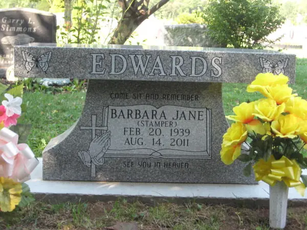 A granite memorial bench crafted by American Monument & Granite Co.