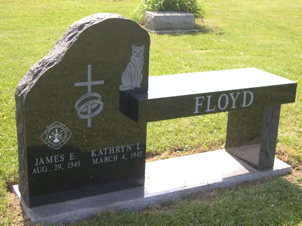 A granite memorial bench crafted by American Monument & Granite Co.