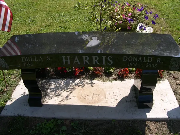 A granite memorial bench crafted by American Monument & Granite Co.