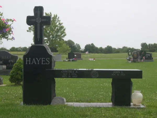 A granite memorial bench crafted by American Monument & Granite Co.