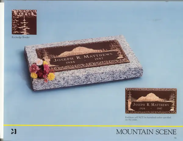 A catalog design for a cast bronze memorial plate with a mountain scene and pine border in relief, shown on a light granite base