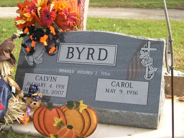 A slant granite marker crafted by American Monument & Granite Co.