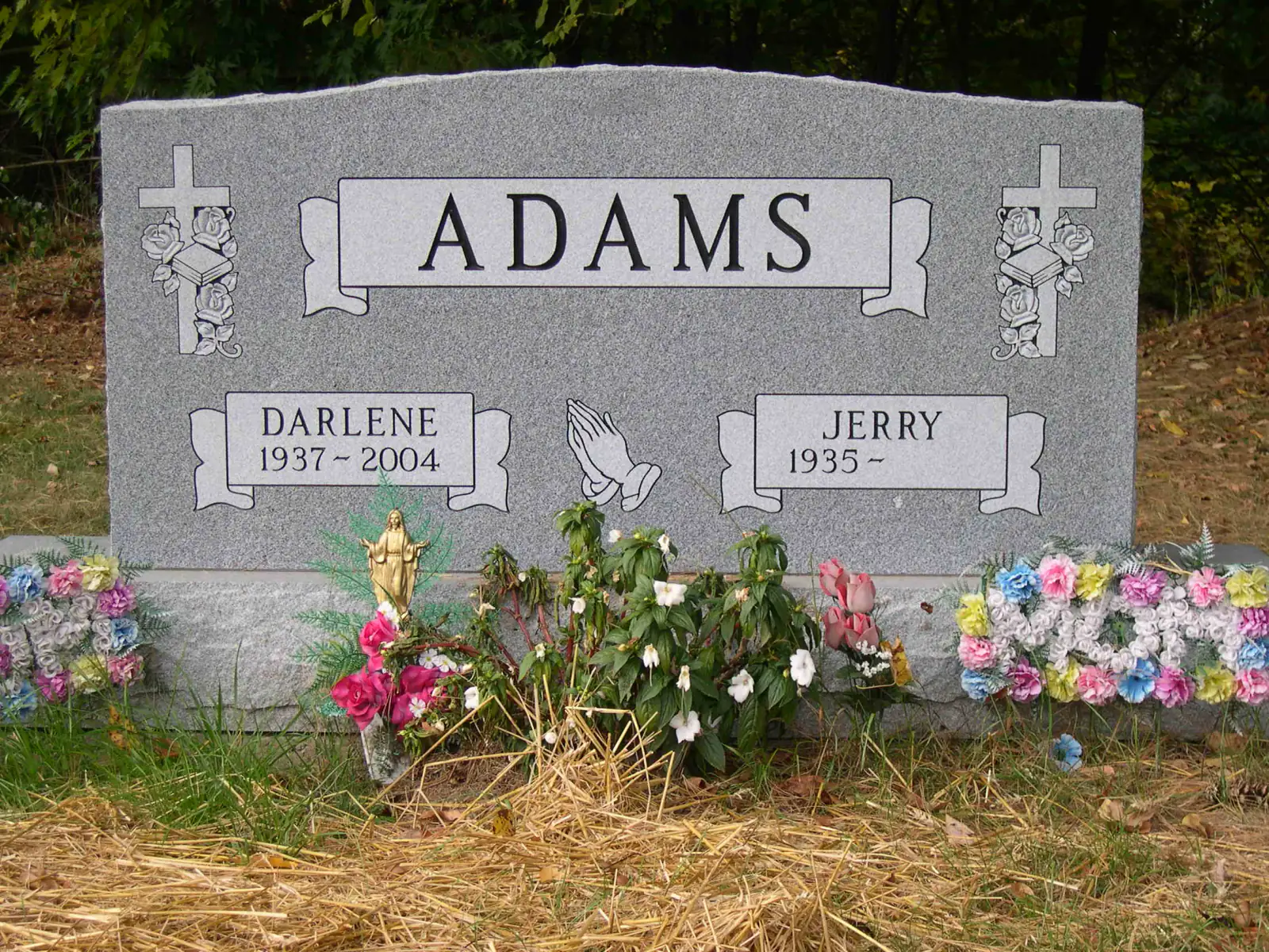 An upright granite monument crafted by American Monument & Granite Co.