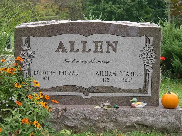 An upright granite monument crafted by American Monument & Granite Co.